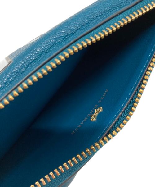 ANYA HINDMARCH（アニヤ・ハインドマーチ）ANYA HINDMARCH (アニヤ・ハインドマーチ) KELLOGGS (ケロッグ) KELLOGGS トニーザタイガー ジップフォンポーチ ターコイズの古着・服飾アイテム