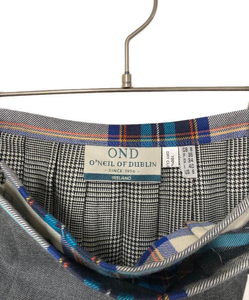 O'NEIL OF DUBLIN（オニールオブダブリン）O'NEIL OF DUBLIN (オニールオブダブリン) チェック切替 ウールラッププリーツスカート グレー×ブルー サイズ:36の古着・服飾アイテム