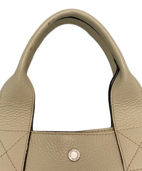 Accessoires De Mademoiselle（アクセソワ・ドゥ・マドモアゼル）Accessoires De Mademoiselle (アクセソワ・ドゥ・マドモアゼル) レザーハンドバッグ アイボリーの古着・服飾アイテム