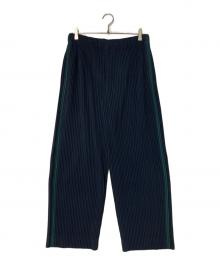 HOMME PLISSE ISSEY MIYAKE（オム プリッセ イッセイ ミヤケ）の古着「サイドライン プリーツパンツ」｜ネイビー×グリーン
