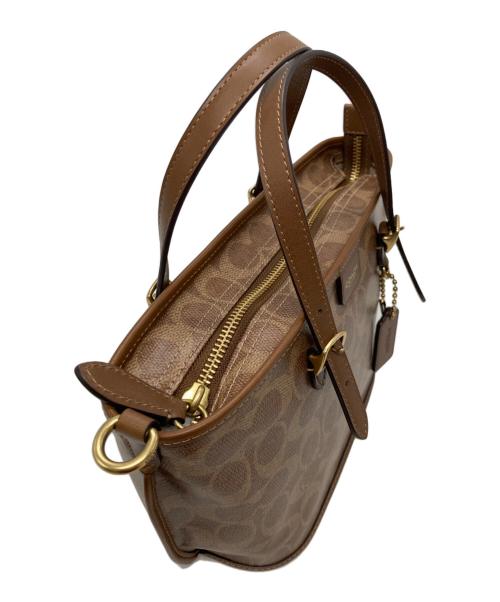 COACH（コーチ）COACH (コーチ) タクシー トート バッグ 21 ブラウンの古着・服飾アイテム