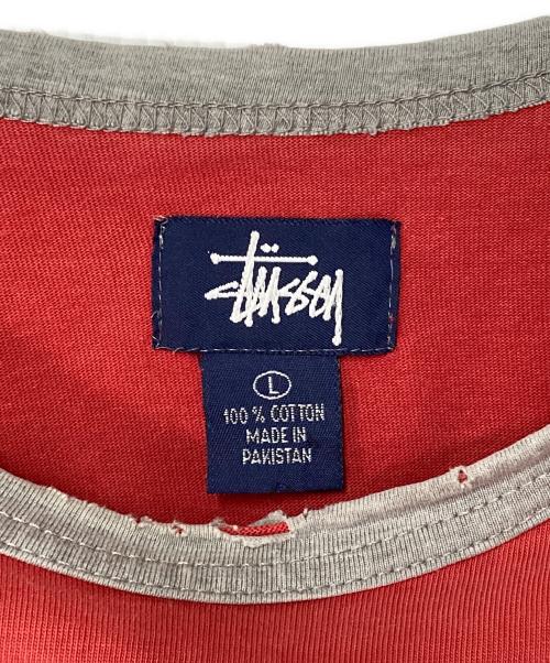 stussy（ステューシー）stussy (ステューシー) ラグランカットソー レッド×グレー サイズ:Lの古着・服飾アイテム