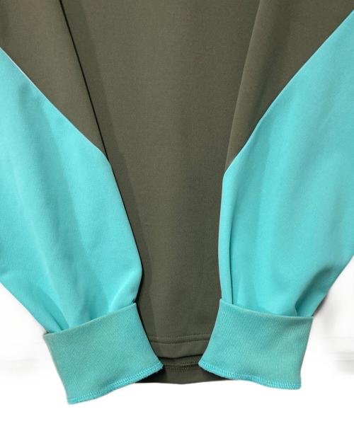 F.C.R.B.（エフシーレアルブリストル）F.C.R.B. (エフシーレアルブリストル) STREAM LINE L/S TOP オリーブ×ブルー サイズ:Mの古着・服飾アイテム