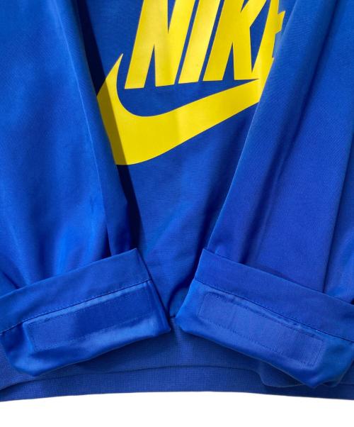 NIKE（ナイキ）NIKE (ナイキ) RISE PACK WOVEN JACKET ブルー×イエロー サイズ:Lの古着・服飾アイテム
