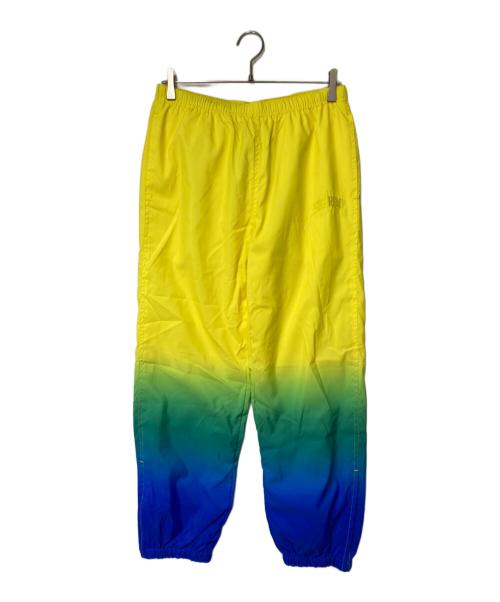 SUPREME（シュプリーム）SUPREME (シュプリーム) グラデーションナイロントラックパンツ ブルー×イエロー サイズ:Sの古着・服飾アイテム