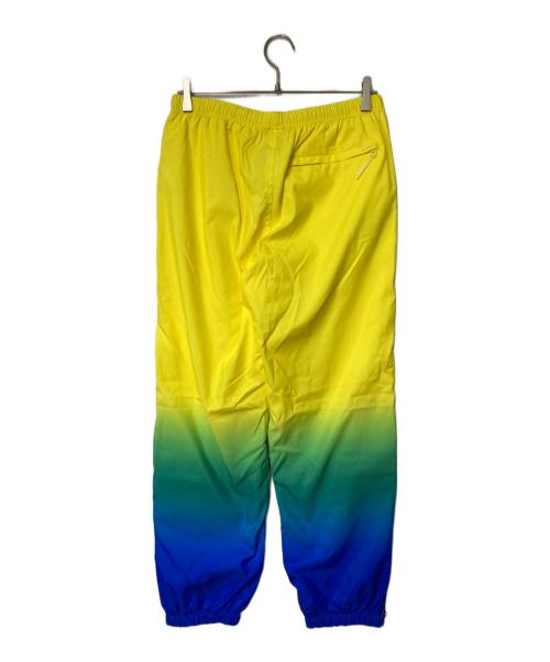 SUPREME（シュプリーム）SUPREME (シュプリーム) グラデーションナイロントラックパンツ ブルー×イエロー サイズ:Sの古着・服飾アイテム