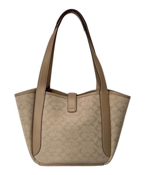 COACH（コーチ）COACH (コーチ) ハドリー ターンロック トート バッグ・シグネチャー キャンバス ベージュの古着・服飾アイテム