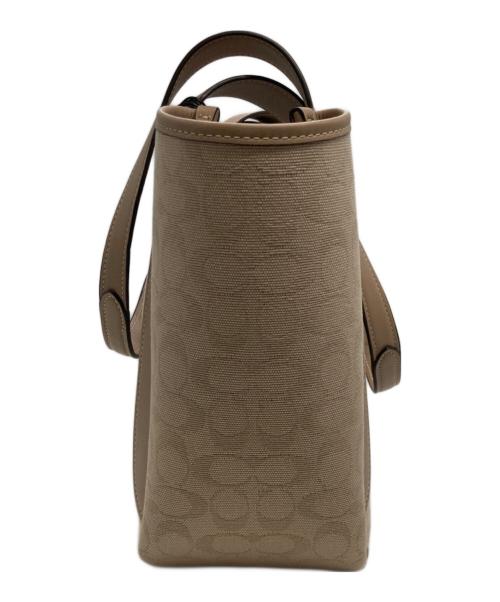 COACH（コーチ）COACH (コーチ) ハドリー ターンロック トート バッグ・シグネチャー キャンバス ベージュの古着・服飾アイテム