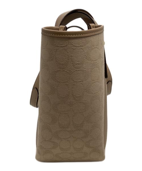 COACH（コーチ）COACH (コーチ) ハドリー ターンロック トート バッグ・シグネチャー キャンバス ベージュの古着・服飾アイテム