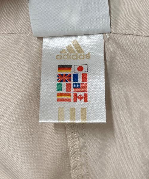 adidas（アディダス）adidas (アディダス) サイドラインパンツ ベージュ サイズ:Ｌの古着・服飾アイテム