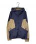 OAKLEY（オークリー）の古着「Enhance Ub Ripstop Wind Jacket」｜ネイビー×ブラウン