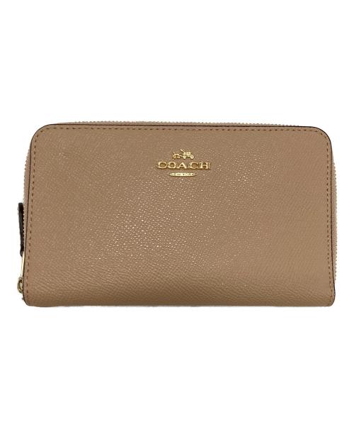 COACH（コーチ）COACH (コーチ) ラウンドファスナー財布 ピンクの古着・服飾アイテム