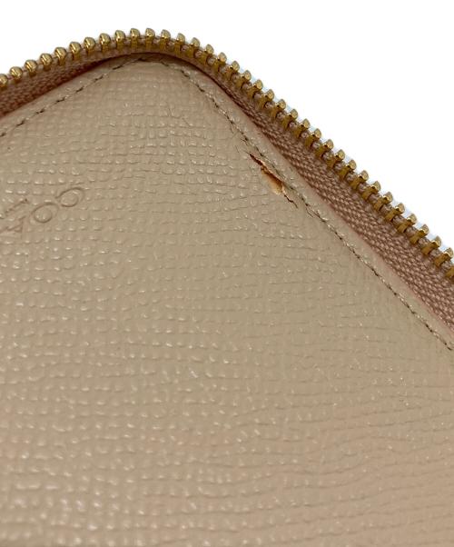 COACH（コーチ）COACH (コーチ) ラウンドファスナー財布 ピンクの古着・服飾アイテム