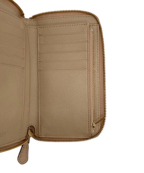 COACH（コーチ）COACH (コーチ) ラウンドファスナー財布 ピンクの古着・服飾アイテム