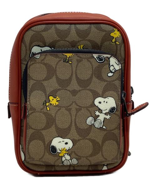 COACH（コーチ）COACH (コーチ) PEANUTS (ピーナッツ) ラック パック 14・シグネチャー・スヌーピー ウッドストック ブラウンの古着・服飾アイテム