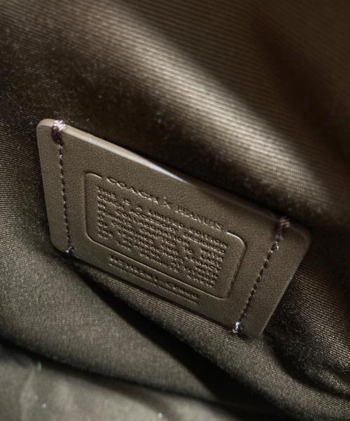 COACH（コーチ）COACH (コーチ) PEANUTS (ピーナッツ) ラック パック 14・シグネチャー・スヌーピー ウッドストック ブラウンの古着・服飾アイテム