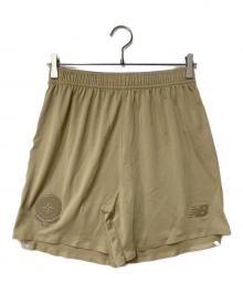 STONE ISLAND×NEW BALANCE（ストーンアイランド×ニューバランス）の古着「フットボールショーツ」｜ベージュ