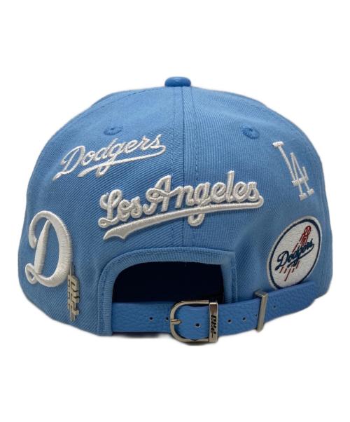 MLB（エムエルビー）MLB (エムエルビー) GENUINE MERCHANDISE (ジェニュイン マーチャンダイズ) レザー切替 ロゴ刺繍キャップ スカイブルーの古着・服飾アイテム