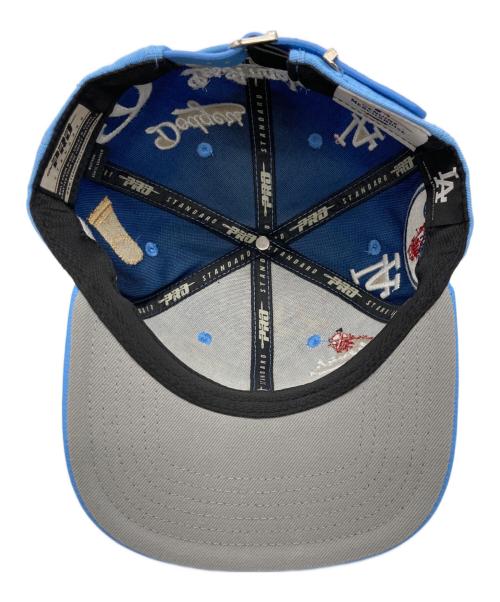 MLB（エムエルビー）MLB (エムエルビー) GENUINE MERCHANDISE (ジェニュイン マーチャンダイズ) レザー切替 ロゴ刺繍キャップ スカイブルーの古着・服飾アイテム