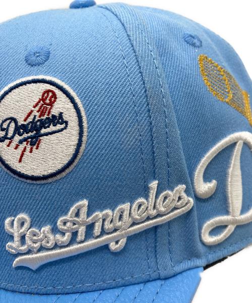 MLB（エムエルビー）MLB (エムエルビー) GENUINE MERCHANDISE (ジェニュイン マーチャンダイズ) レザー切替 ロゴ刺繍キャップ スカイブルーの古着・服飾アイテム
