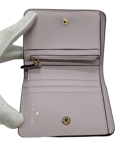 Kate Spade（ケイトスペード）Kate Spade (ケイトスペード) 2つ折り財布 イエローの古着・服飾アイテム