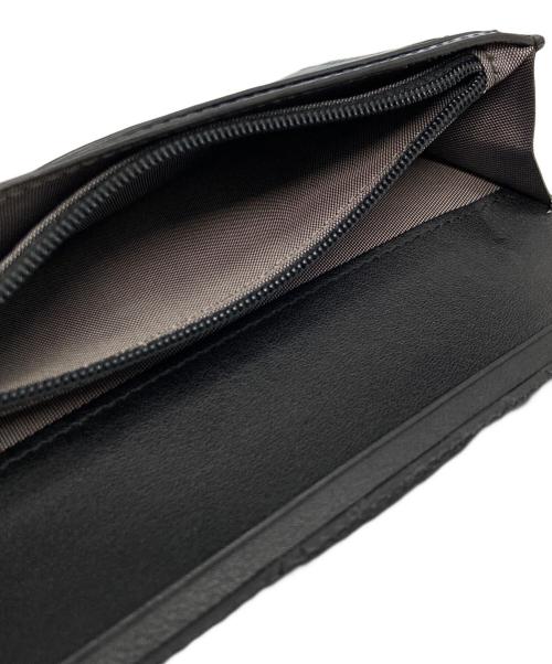 TUMI（トゥミ）TUMI (トゥミ) 長財布 ネイビーの古着・服飾アイテム
