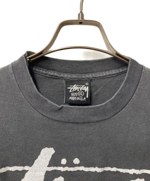 stussy（ステューシー）stussy (ステューシー) プリントTシャツ ブラック サイズ:XLの古着・服飾アイテム