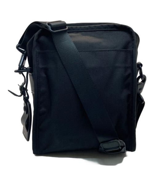 TUMI（トゥミ）TUMI (トゥミ) スモール・フラップ・ボディバッグ ブラックの古着・服飾アイテム