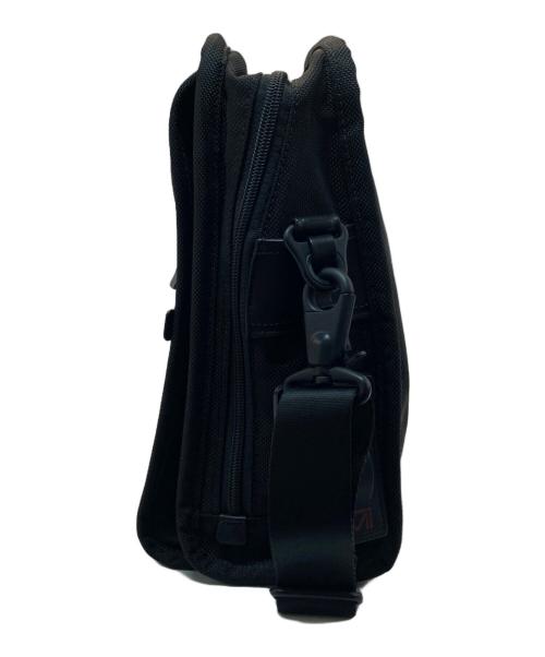 TUMI（トゥミ）TUMI (トゥミ) スモール・フラップ・ボディバッグ ブラックの古着・服飾アイテム