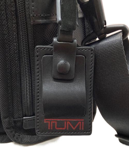 TUMI（トゥミ）TUMI (トゥミ) スモール・フラップ・ボディバッグ ブラックの古着・服飾アイテム