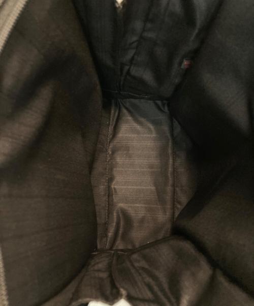 TUMI（トゥミ）TUMI (トゥミ) スモール・フラップ・ボディバッグ ブラックの古着・服飾アイテム