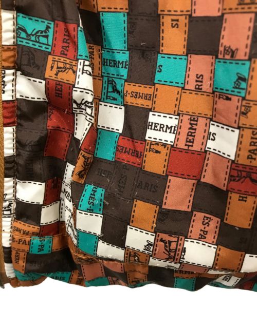 HERMES（エルメス）HERMES (エルメス) ボルデュック柄リバーシブル レザートリミング ダウンジャケット ブラウン サイズ:36の古着・服飾アイテム