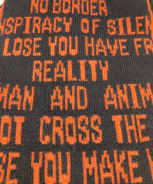 CHRISTIAN DADA（クリスチャンダダ）CHRISTIAN DADA (クリスチャンダダ) Quotes Jacquard Long Knit Scarf ブラック×オレンジの古着・服飾アイテム