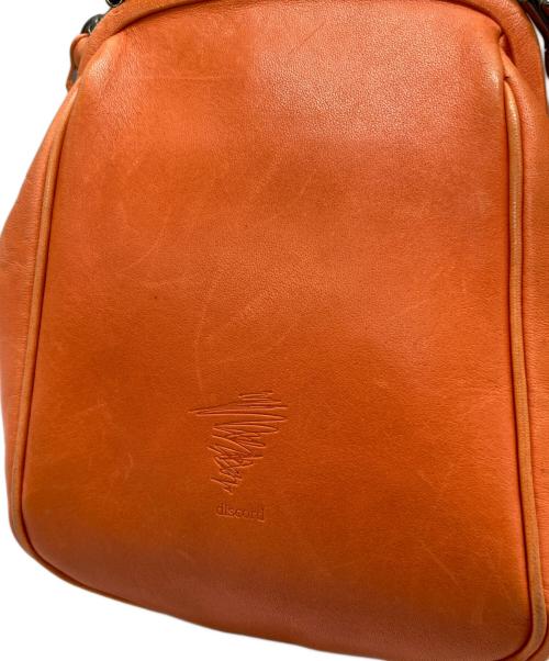 discord Yohji Yamamoto（ディスコード ヨウジヤマモト）discord Yohji Yamamoto (ディスコード ヨウジヤマモト) がま口バッグ オレンジの古着・服飾アイテム