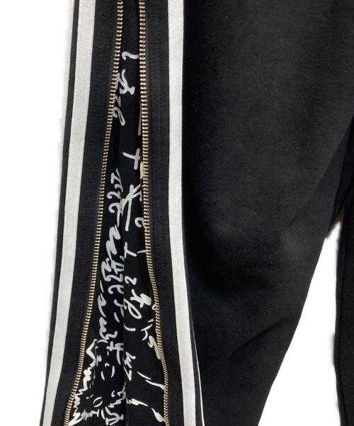 GRANCY（グランシー）GRANCY (グランシー) ジップデザインシュレディンガートラックパンツ ブラック サイズ:L 未使用品の古着・服飾アイテム