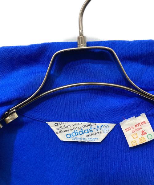 adidas（アディダス）adidas (アディダス) トレフォイルロゴハイネックトラックジャケット ブルー×イエロー サイズ:Sの古着・服飾アイテム