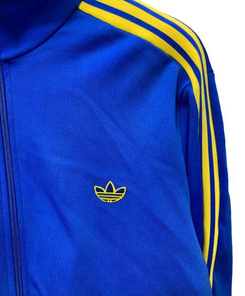 adidas（アディダス）adidas (アディダス) トレフォイルロゴハイネックトラックジャケット ブルー×イエロー サイズ:Sの古着・服飾アイテム