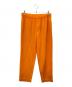 HOMME PLISSE ISSEY MIYAKE（オムプリッセ イッセイ ミヤケ）の古着「プリーツイージーパンツ」｜オレンジ