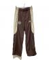 UMBRO（アンブロ）の古着「別注ナイロンパンツ」｜ブラウン×ベージュ