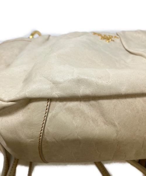 PRADA（プラダ）PRADA (プラダ) タッセル2WAYバッグ アイボリーの古着・服飾アイテム