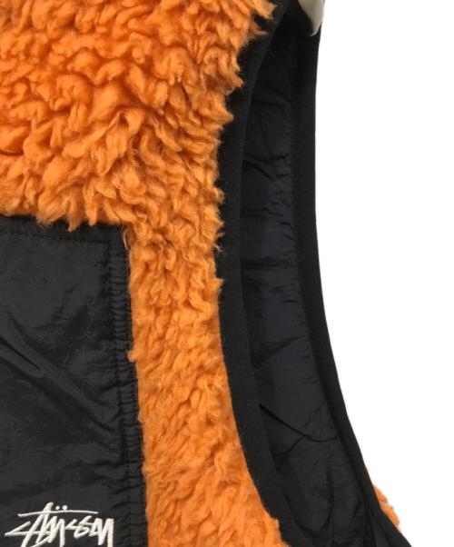 stussy（ステューシー）stussy (ステューシー) Sherpa Reversible Vest オレンジ サイズ:Mの古着・服飾アイテム