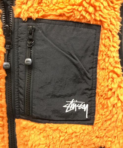 stussy（ステューシー）stussy (ステューシー) Sherpa Reversible Vest オレンジ サイズ:Mの古着・服飾アイテム