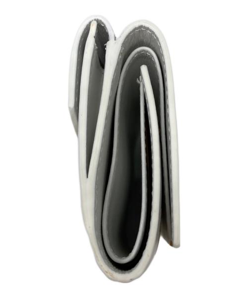 ALAIA（アライア）ALAIA (アライア) Wホックウォレット ホワイトの古着・服飾アイテム