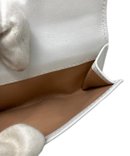 ALAIA（アライア）ALAIA (アライア) Wホックウォレット ホワイトの古着・服飾アイテム