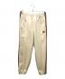 Needles（ニードルズ）の古着「トラックパンツ」｜ベージュ