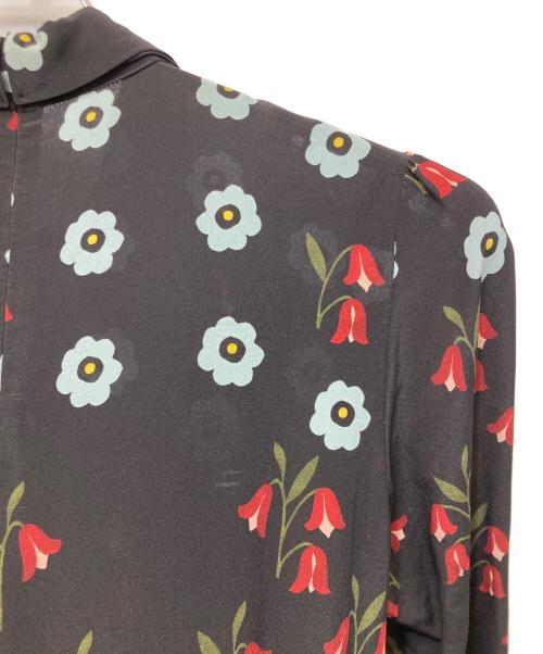 RED VALENTINO（レッドヴァレンティノ）RED VALENTINO (レッドヴァレンティノ) 総柄シルクワンピース ブラック サイズ:40の古着・服飾アイテム