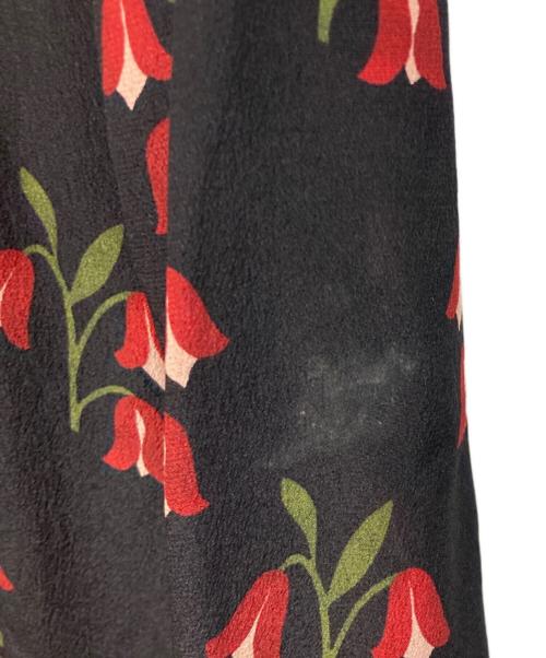 RED VALENTINO（レッドヴァレンティノ）RED VALENTINO (レッドヴァレンティノ) 総柄シルクワンピース ブラック サイズ:40の古着・服飾アイテム