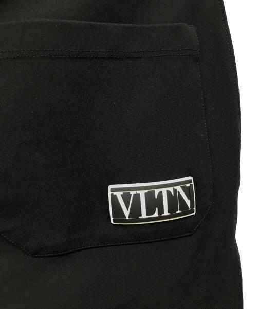 VALENTINO（ヴァレンティノ）VALENTINO (ヴァレンティノ) VLTN ロゴトラックパンツ ブラック×ホワイト サイズ:Sの古着・服飾アイテム