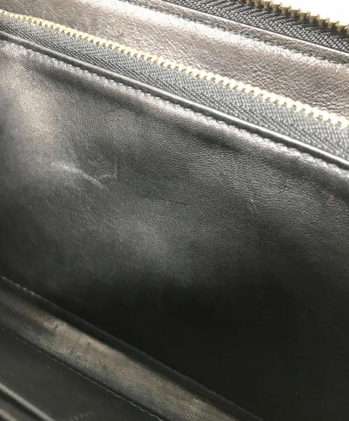 JIMMY CHOO（ジミーチュウ）JIMMY CHOO (ジミーチュウ) スタースタッズラウンドジップウォレット ブラックの古着・服飾アイテム