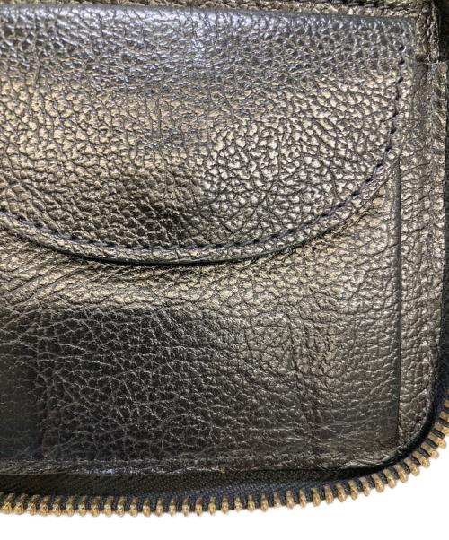 IL BISONTE（イル ビゾンテ）IL BISONTE (イル ビゾンテ) ラウンドジップウォレット ブラックの古着・服飾アイテム